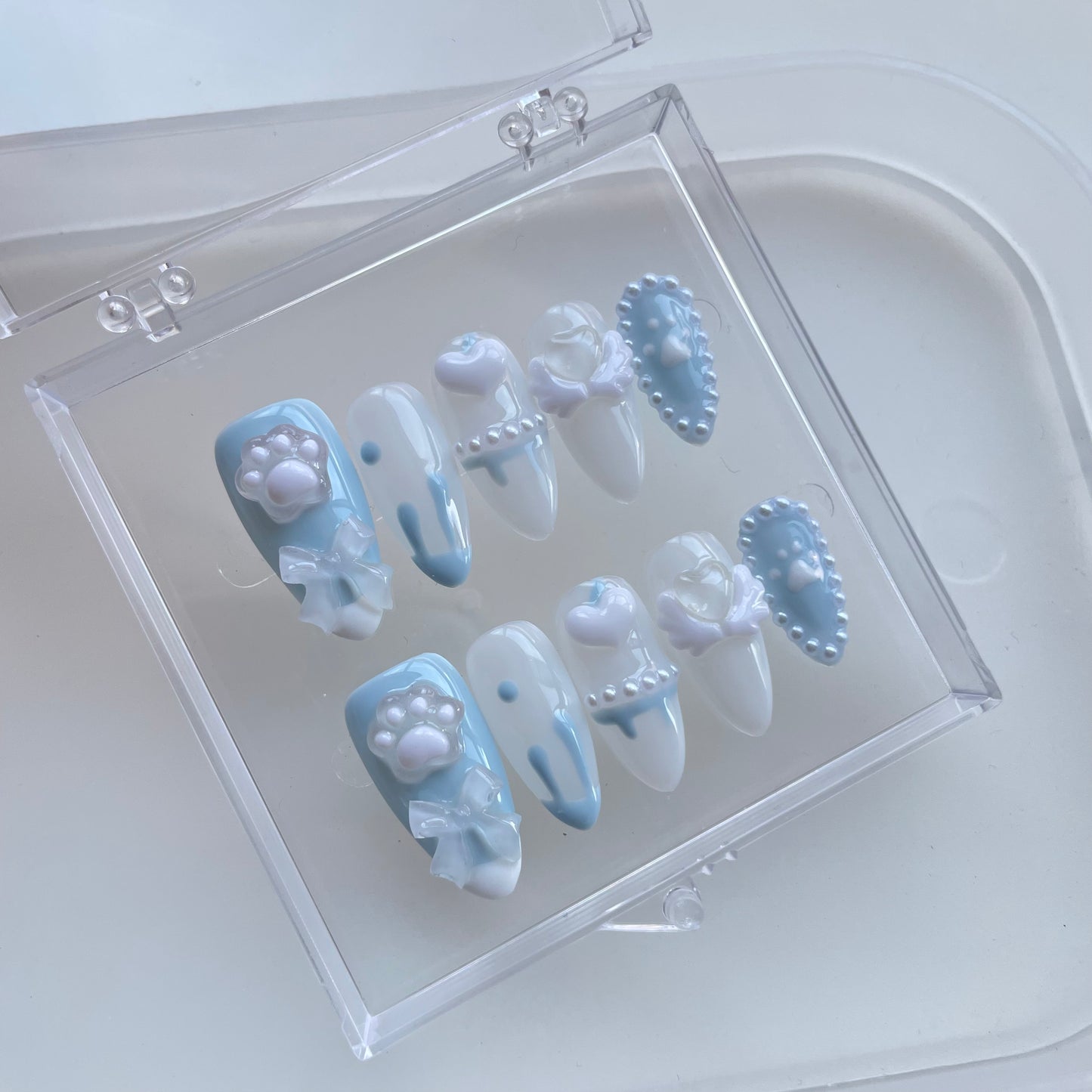Blue cute cat paw